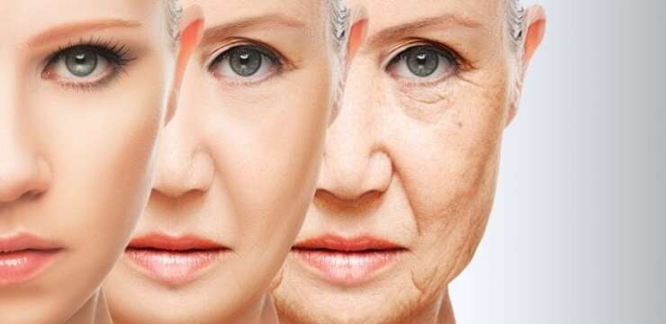 A woman 's face is split in half to show the aging process.