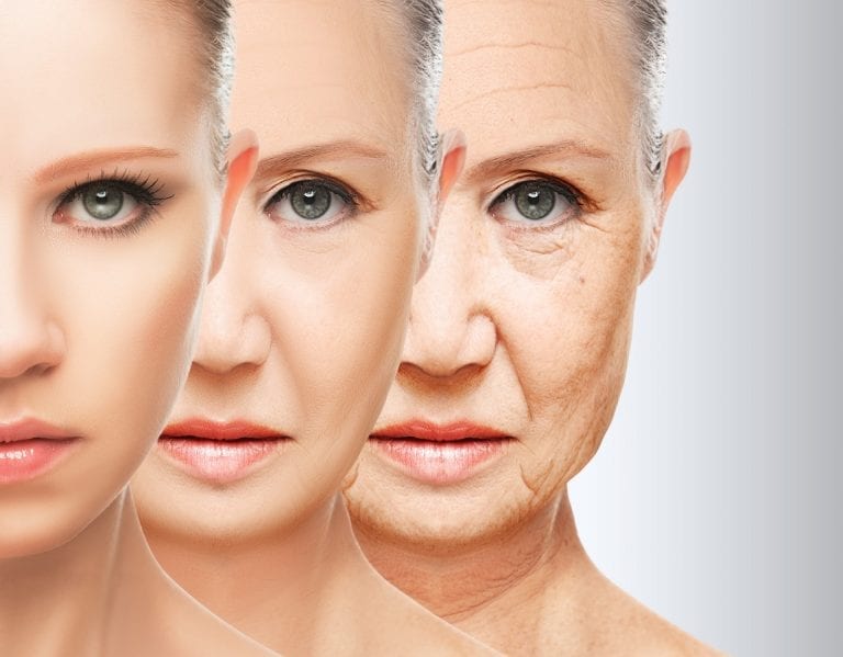 A woman 's face is split in half to show the aging process.