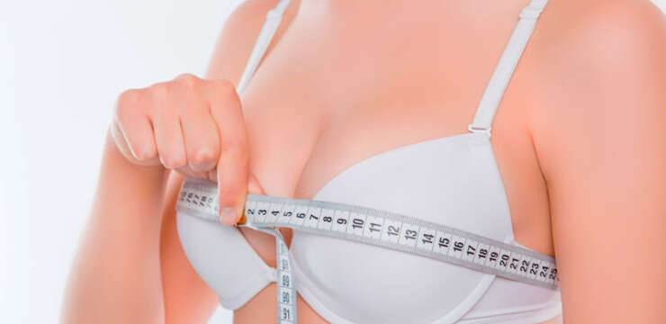 Breast lift vs breast augmentation comparison showing lifted and enhanced breast contours at La Fontaine Cosmetic Surgery Clinic
